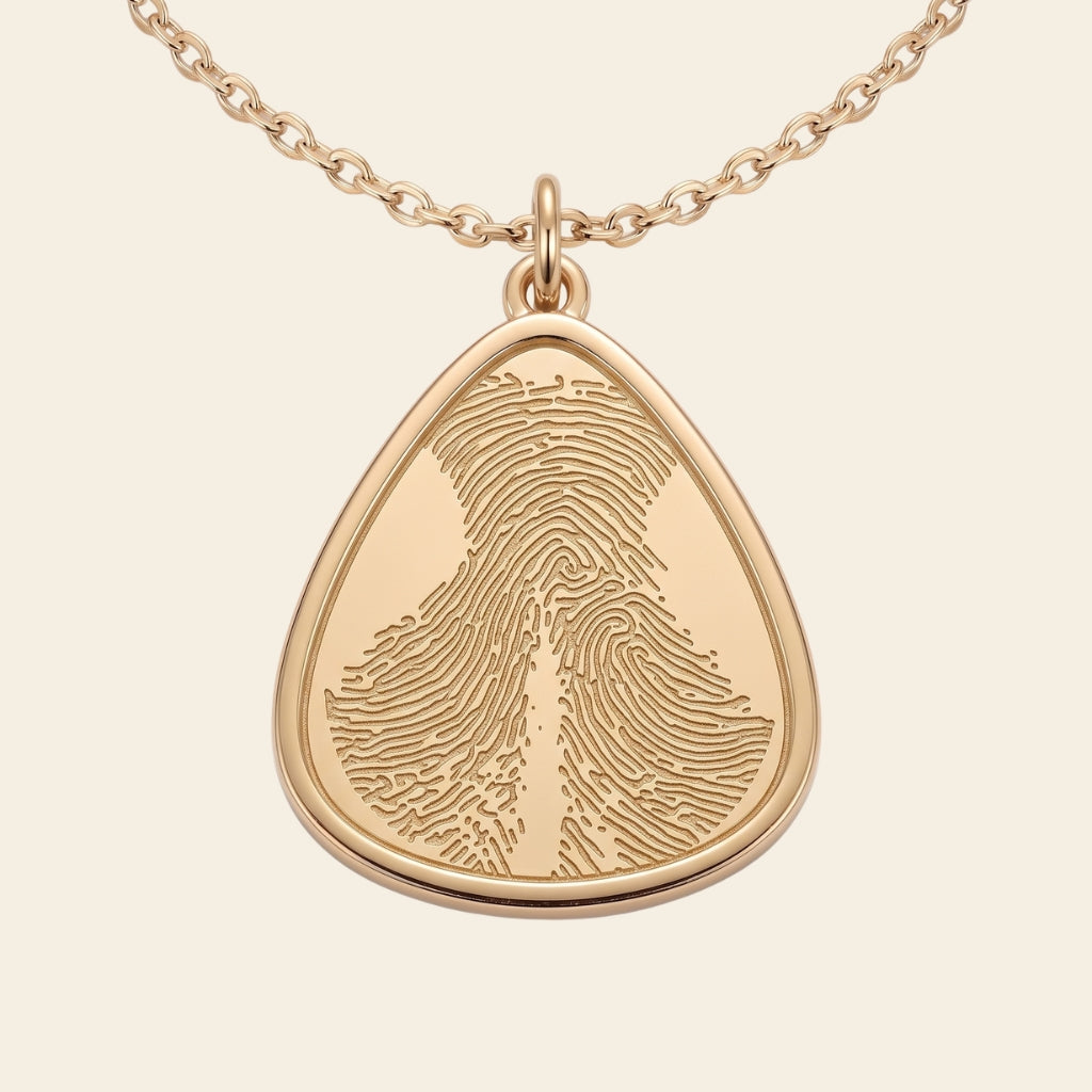 Collier goutte gravé d'une empreinte de truffe – Atelier Ysole